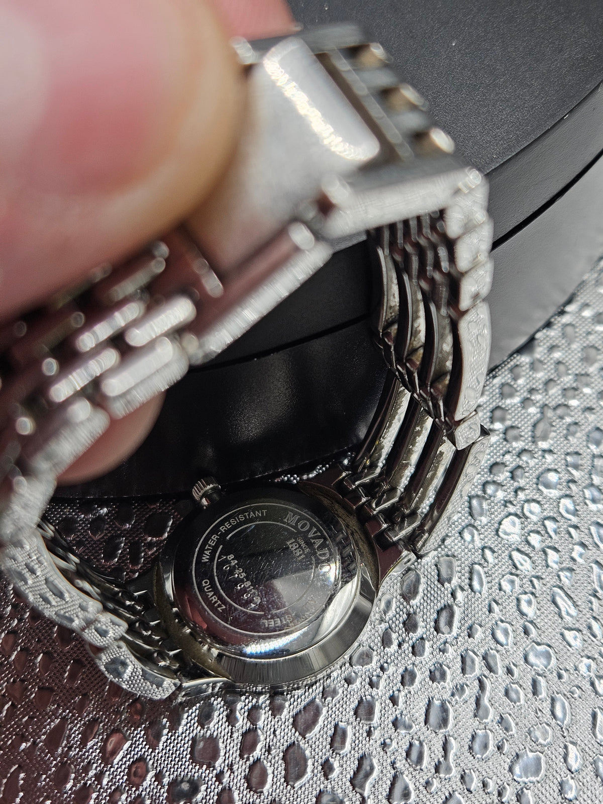 Vintage Movado Esperanza with crystal and black dial face, stainless steel bracelet