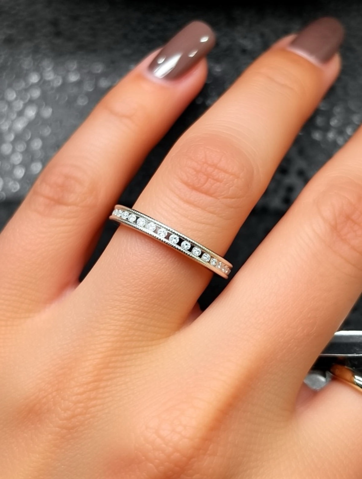 14kt solid white gold Ladies diamond anniversary band channel set with 14 fine white round diamonds