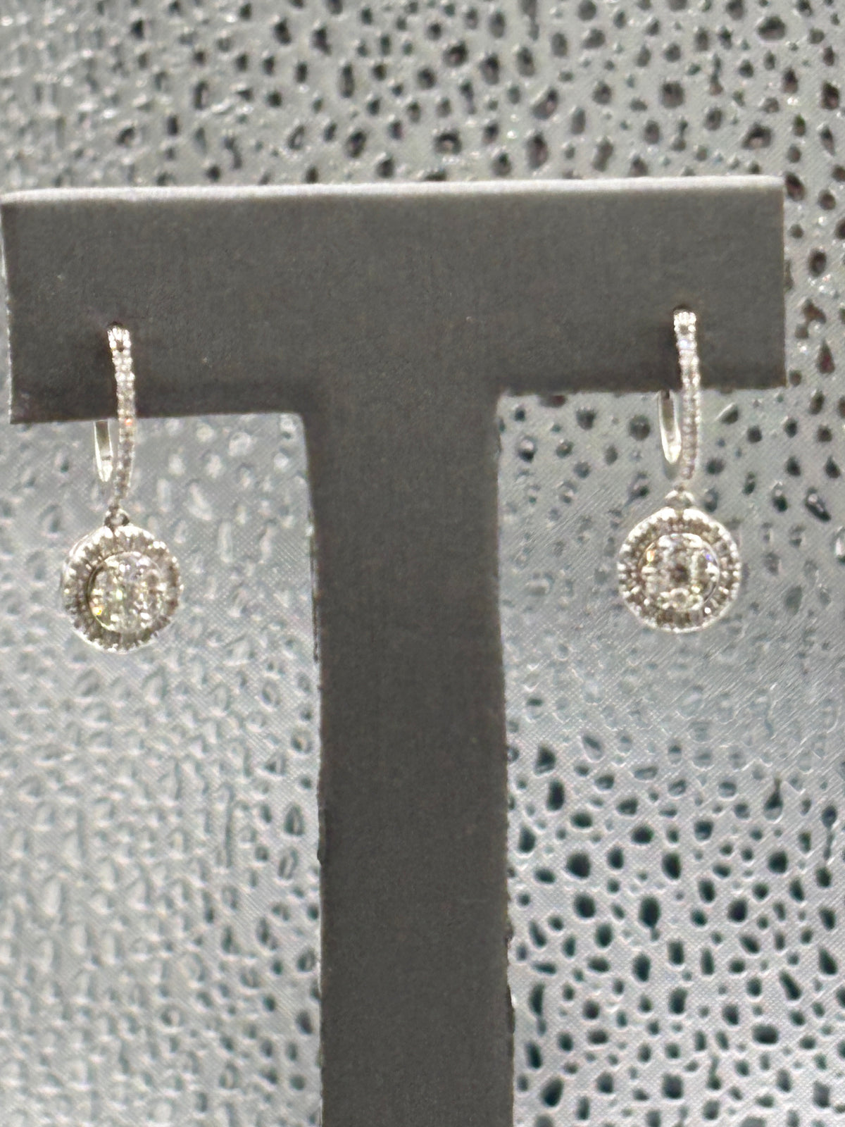 View one of Ladies 14 Karat White Gold Dangling Diamond Halo Earrings