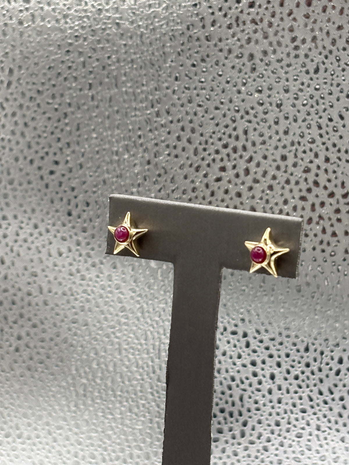 View one of Ladies 14 Karat Yellow Gold Ruby Star Earrings