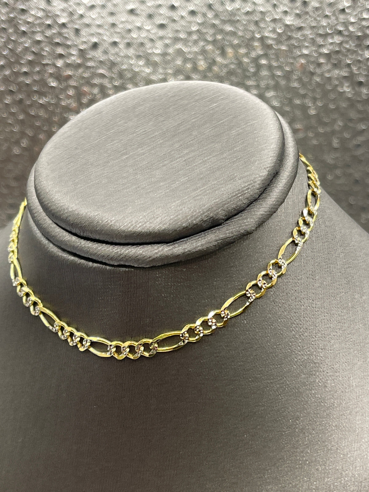 10 Karat Two-Tone Yellow and White Gold Beveled Figaro Bracelet