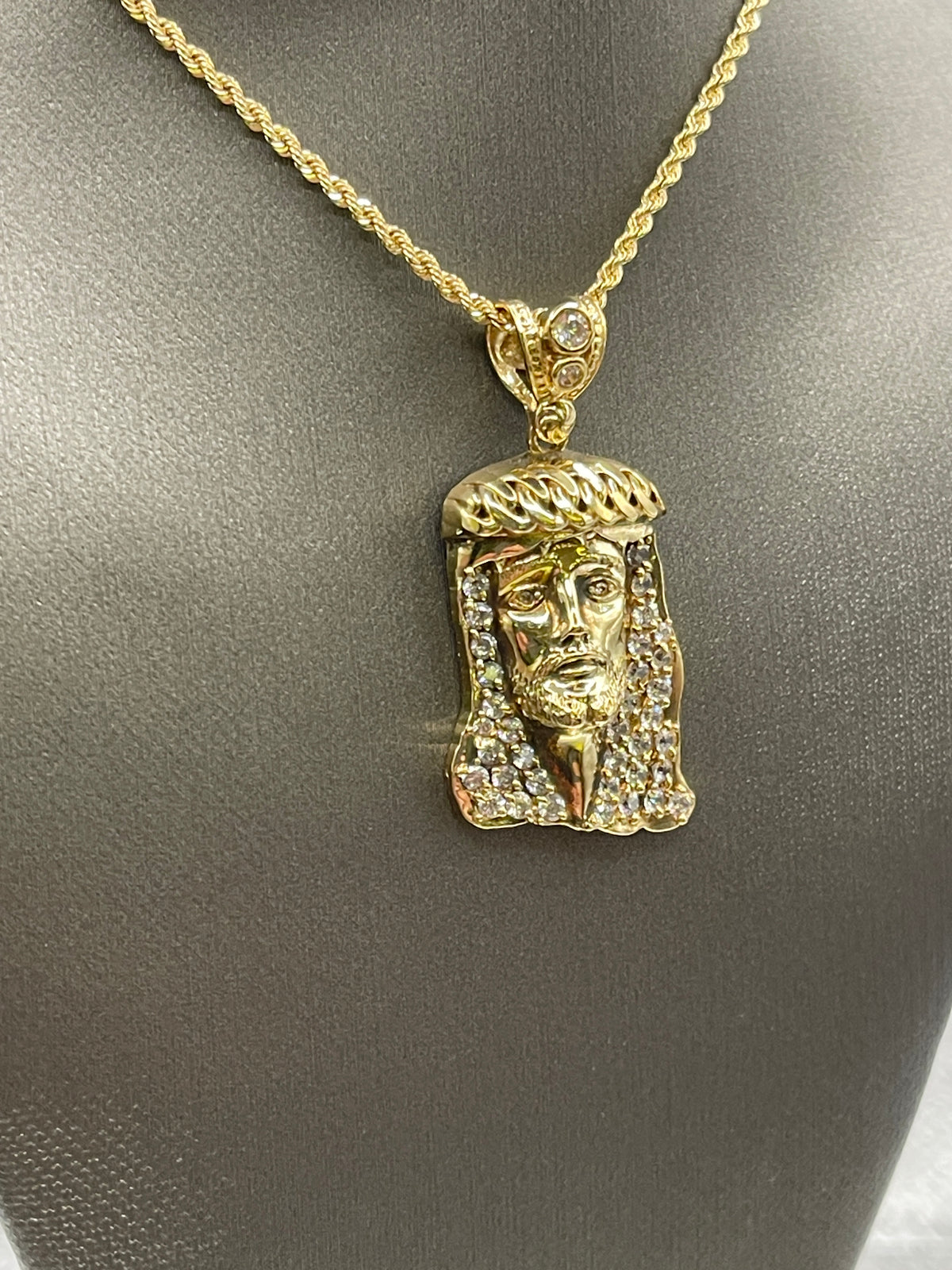 A Fabulous 10 Karat Yellow Gold Jesus Pendant