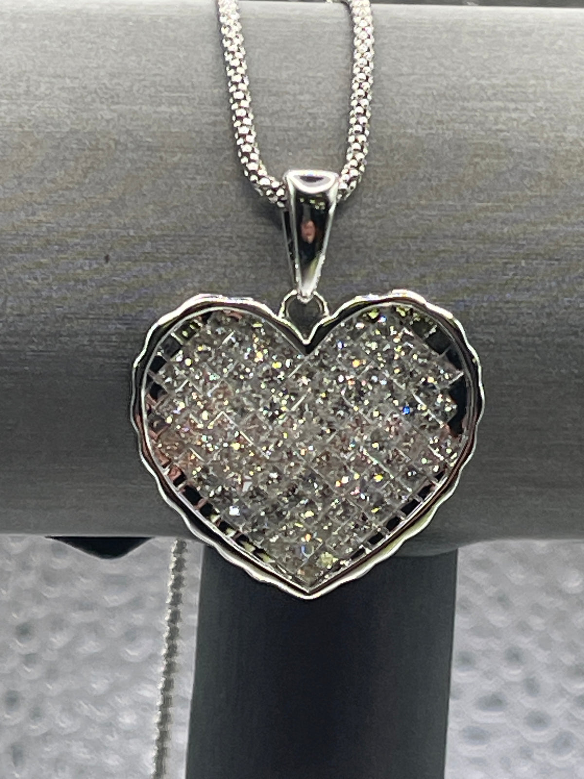 Ladies 14 karat White Gold Princess Cut Diamond Heart Pendant