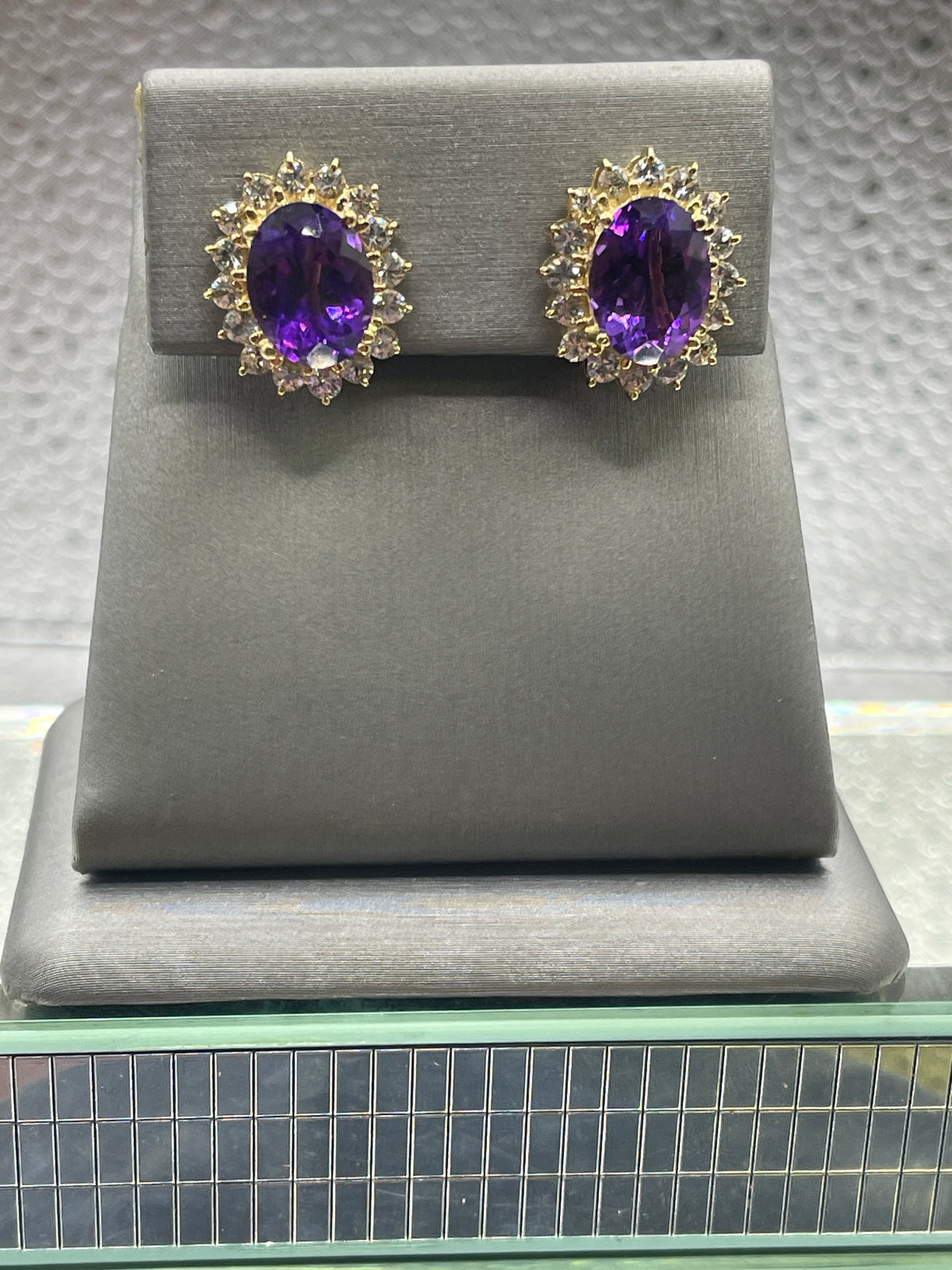 View one of Ladies 14 Karat Oval Yellow Gold Amethyst and Cubic Zircon Earrings