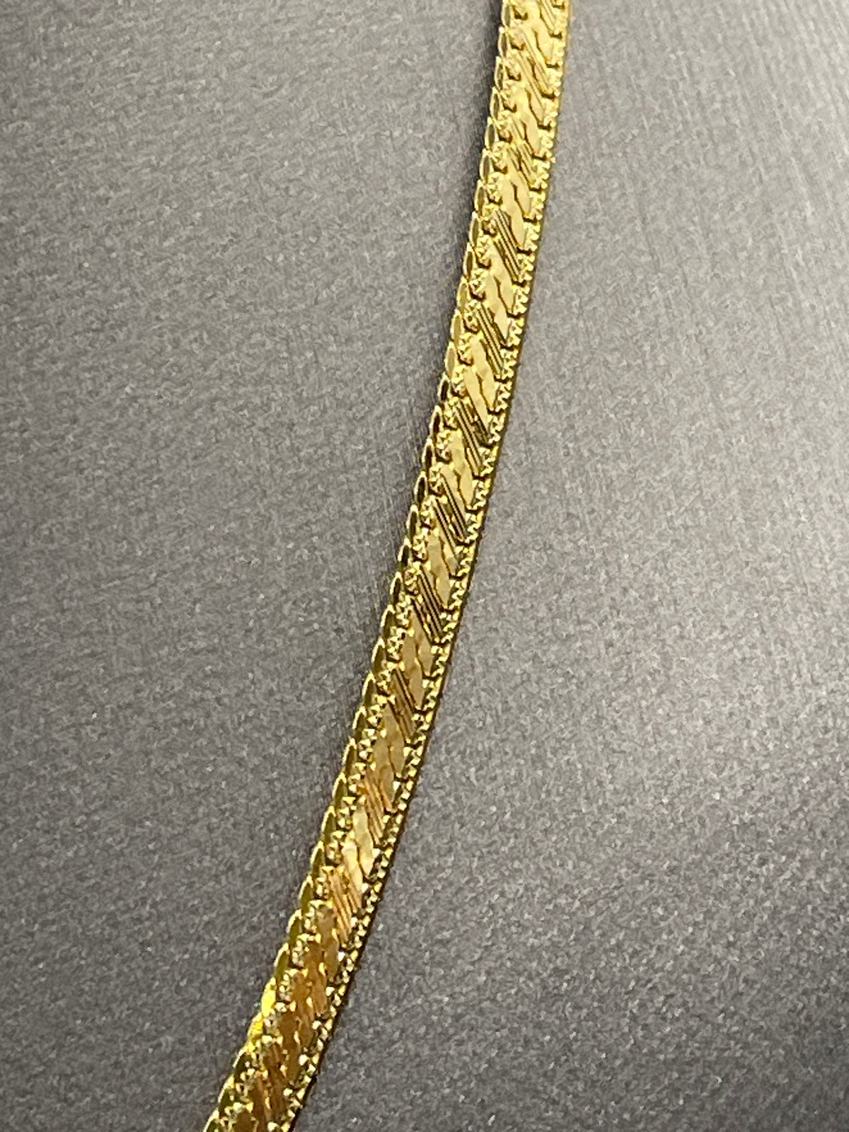 View four of Ladies/Men's 14 Karat Yellow Gold Di-Cut Herringbone Chain