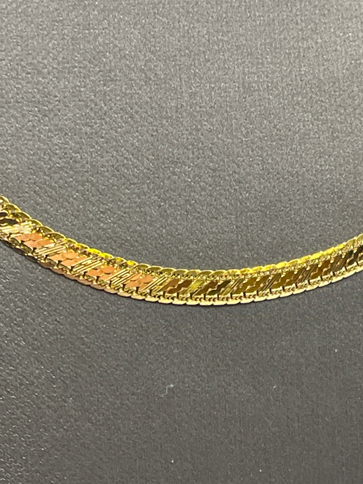 View five of Ladies/Men's 14 Karat Yellow Gold Di-Cut Herringbone Chain