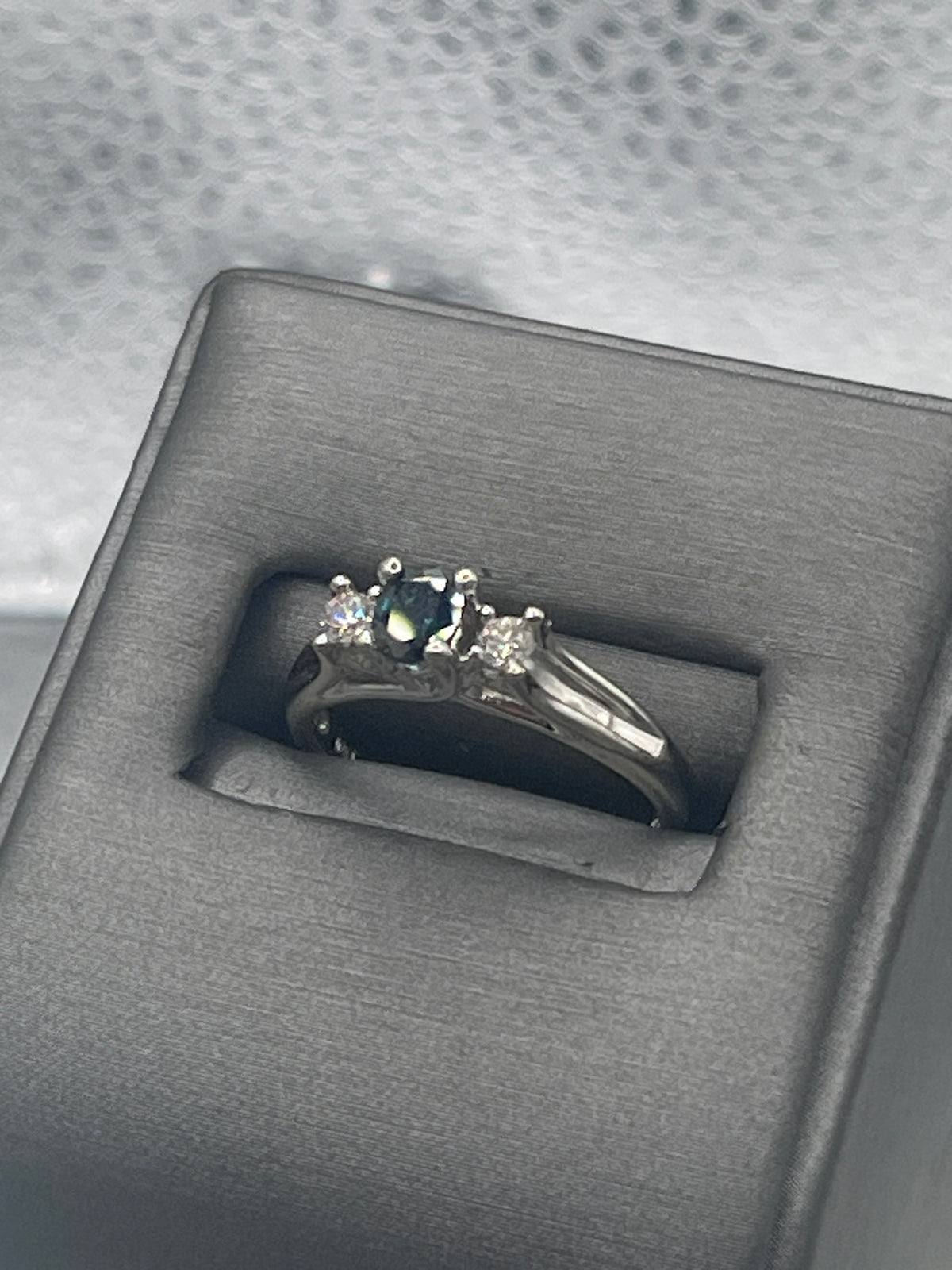 View one of Ladies 10 Karat Solid White Gold Blue Sapphire and Diamond Ring