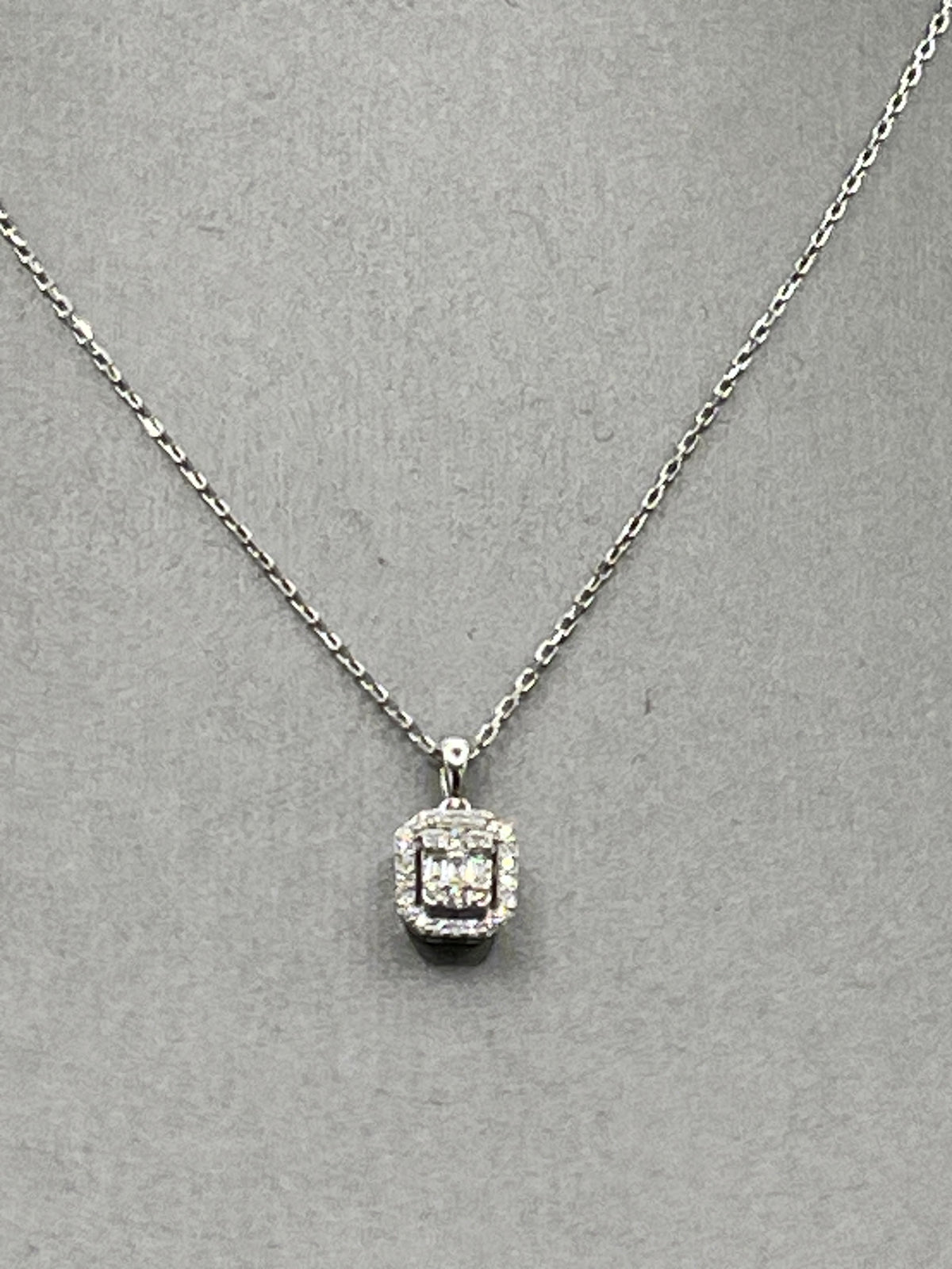 Ladies 18 Karat White Gold Emerald & Round Diamond Halo Pendant & Chain