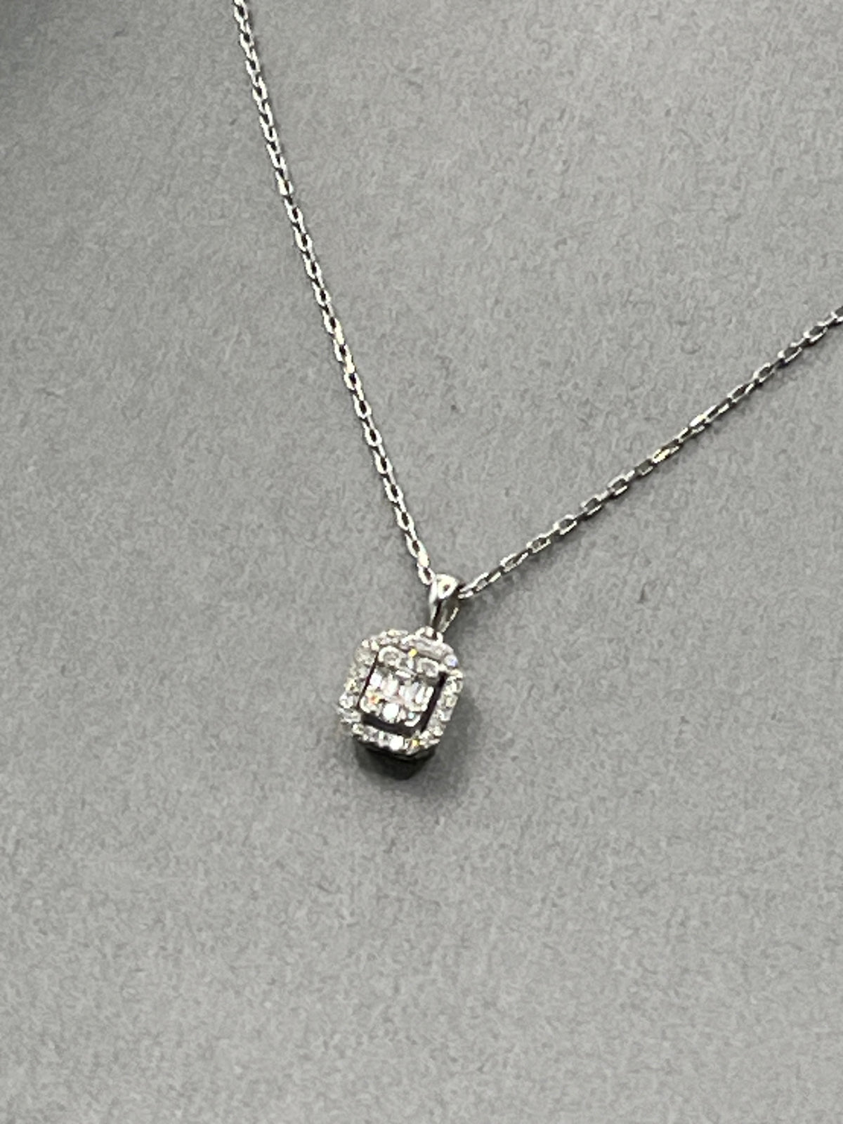 Ladies 18 Karat White Gold Emerald & Round Diamond Halo Pendant & Chain