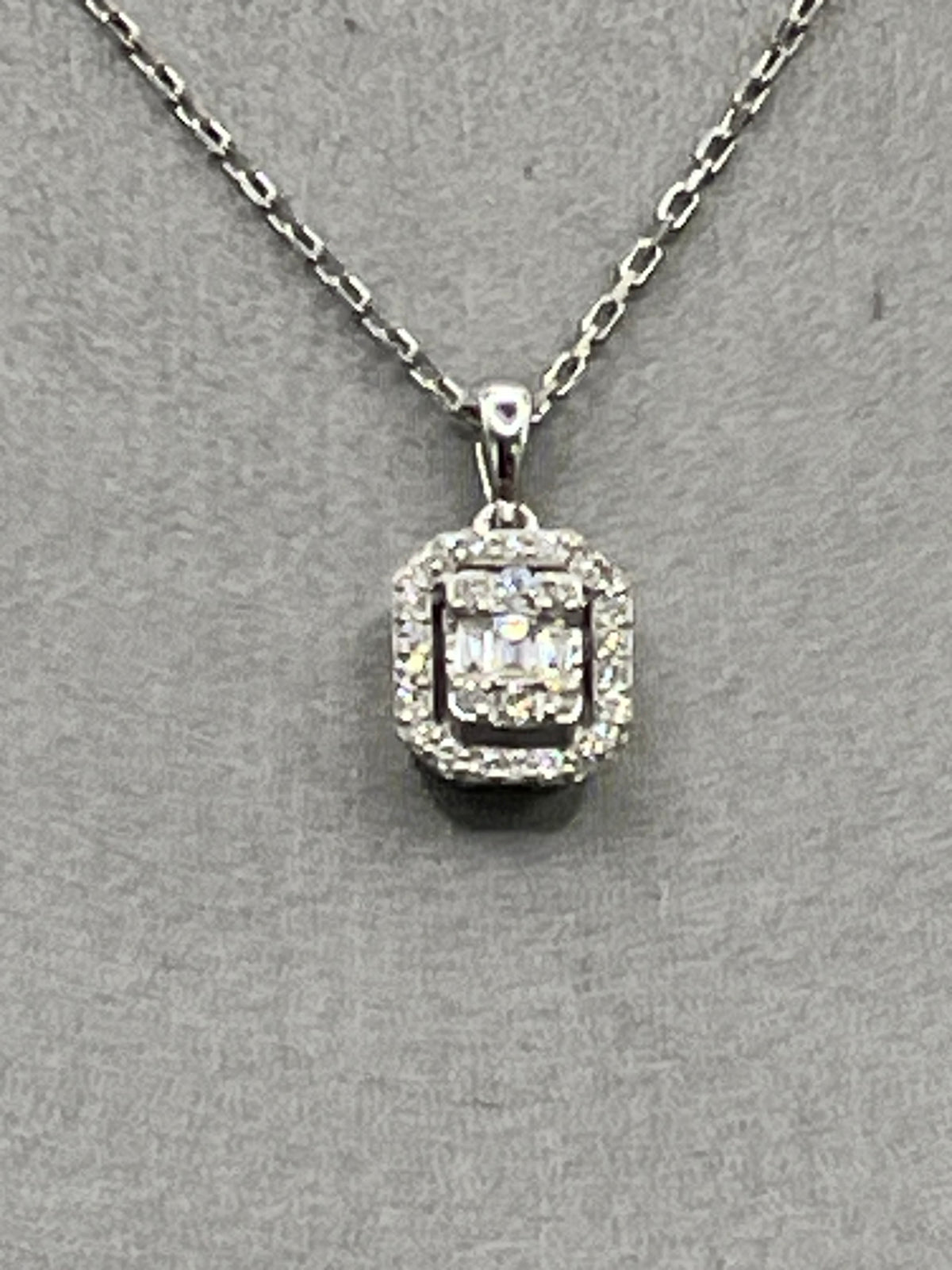 Ladies 18 Karat White Gold Emerald & Round Diamond Halo Pendant & Chain
