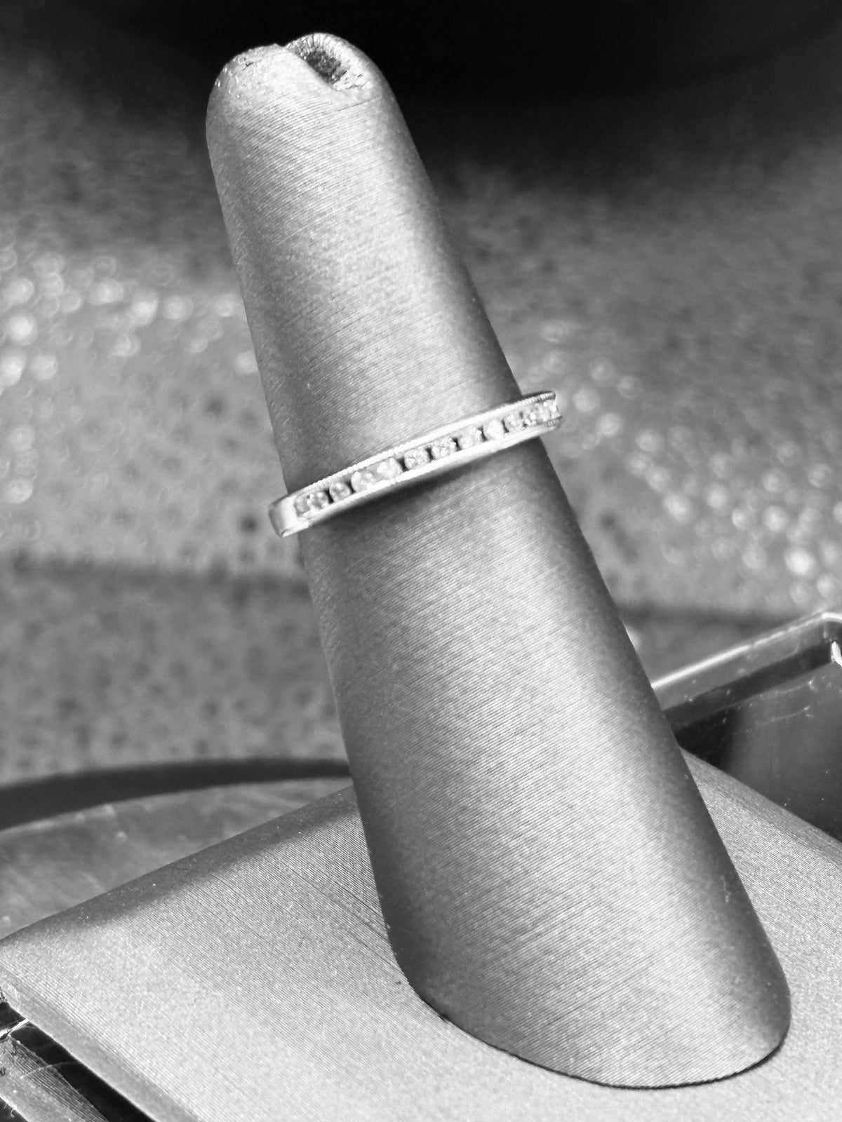 14kt solid white gold Ladies diamond anniversary band channel set with 14 fine white round diamonds