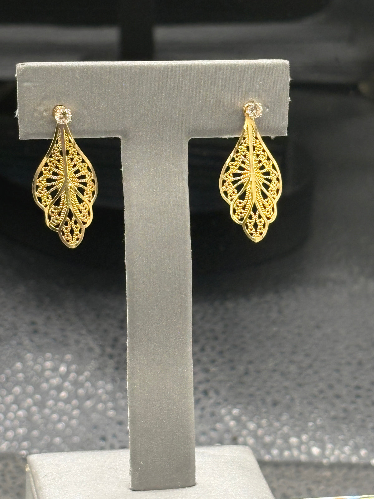 14kt solid yellow gold diamond stud earrings with gold filigree jackets
