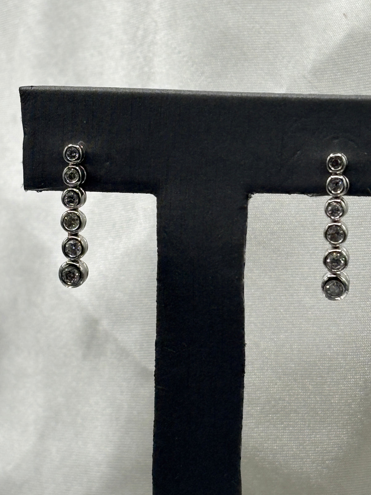 14kt solid white gold ladies diamond drop earrings with bezel-set graduated diamonds