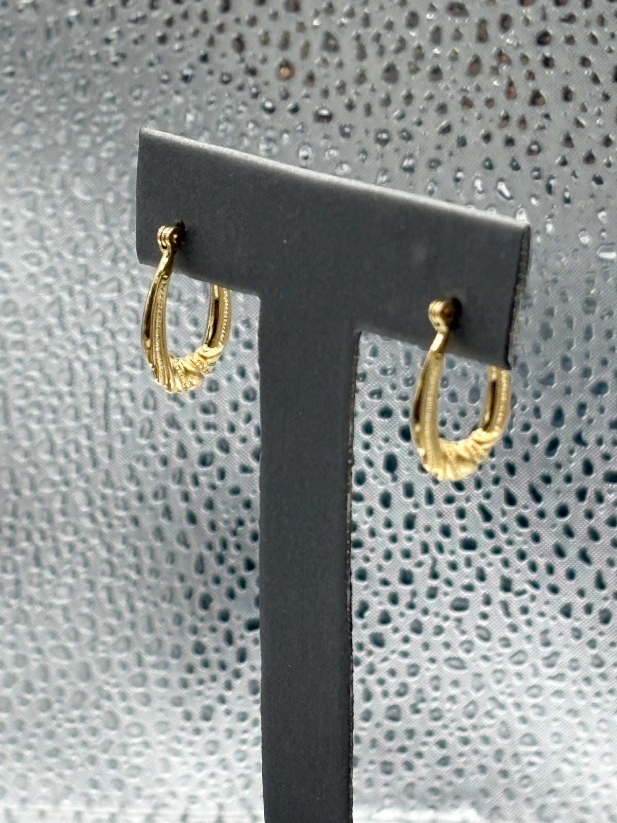 Ladies 14 Karat Yellow Gold Ribbon Hoop Earrings