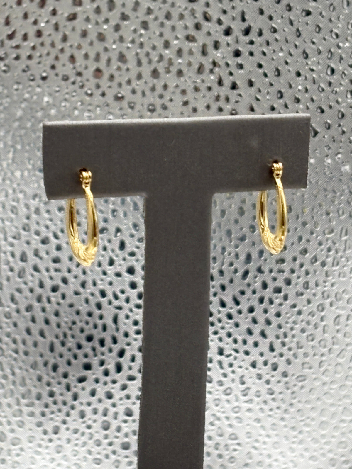 Ladies 14 Karat Yellow Gold Ribbon Hoop Earrings