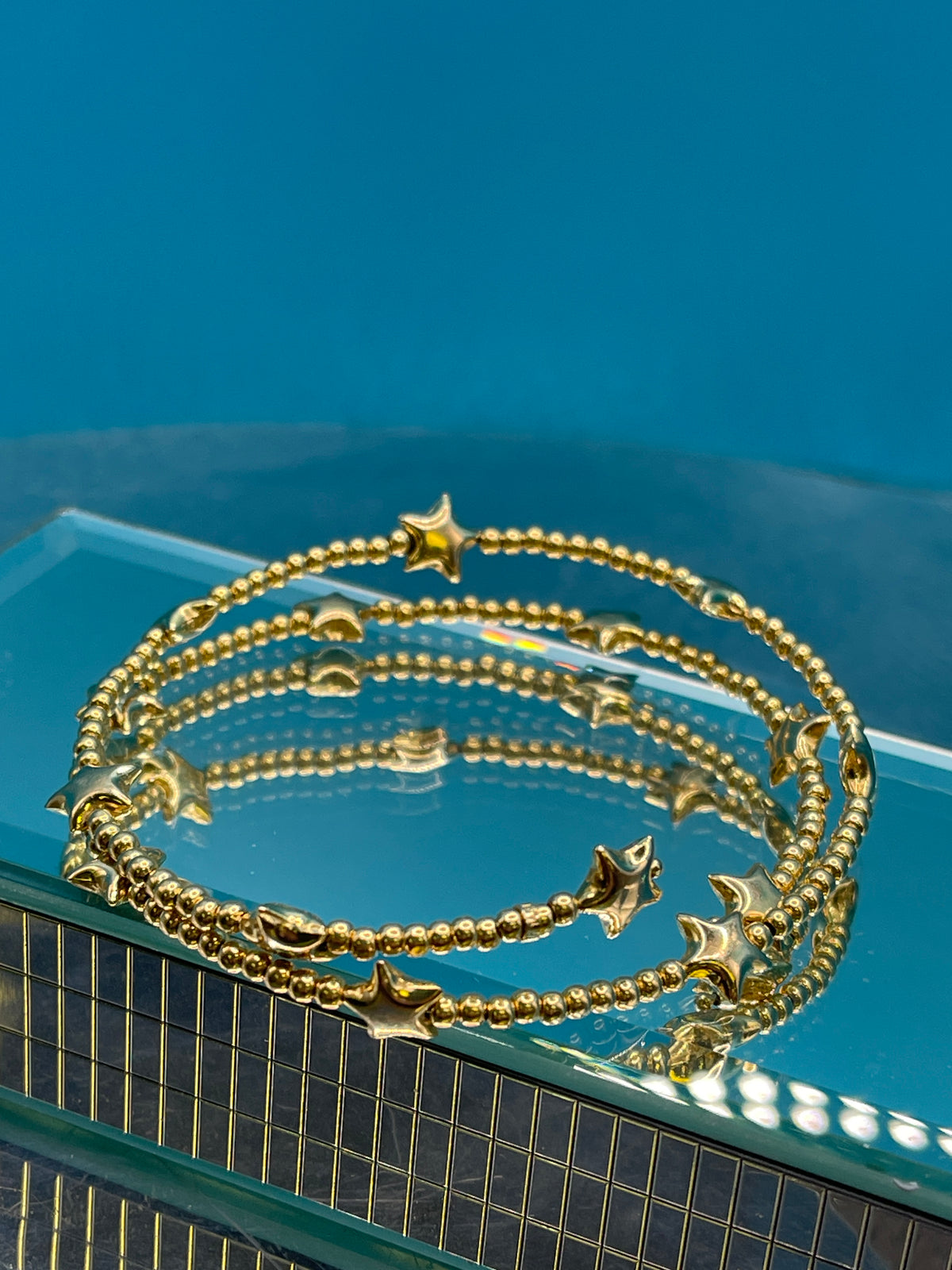 14 Karat Yellow Gold Wrap Around Beaded Star Bracelet