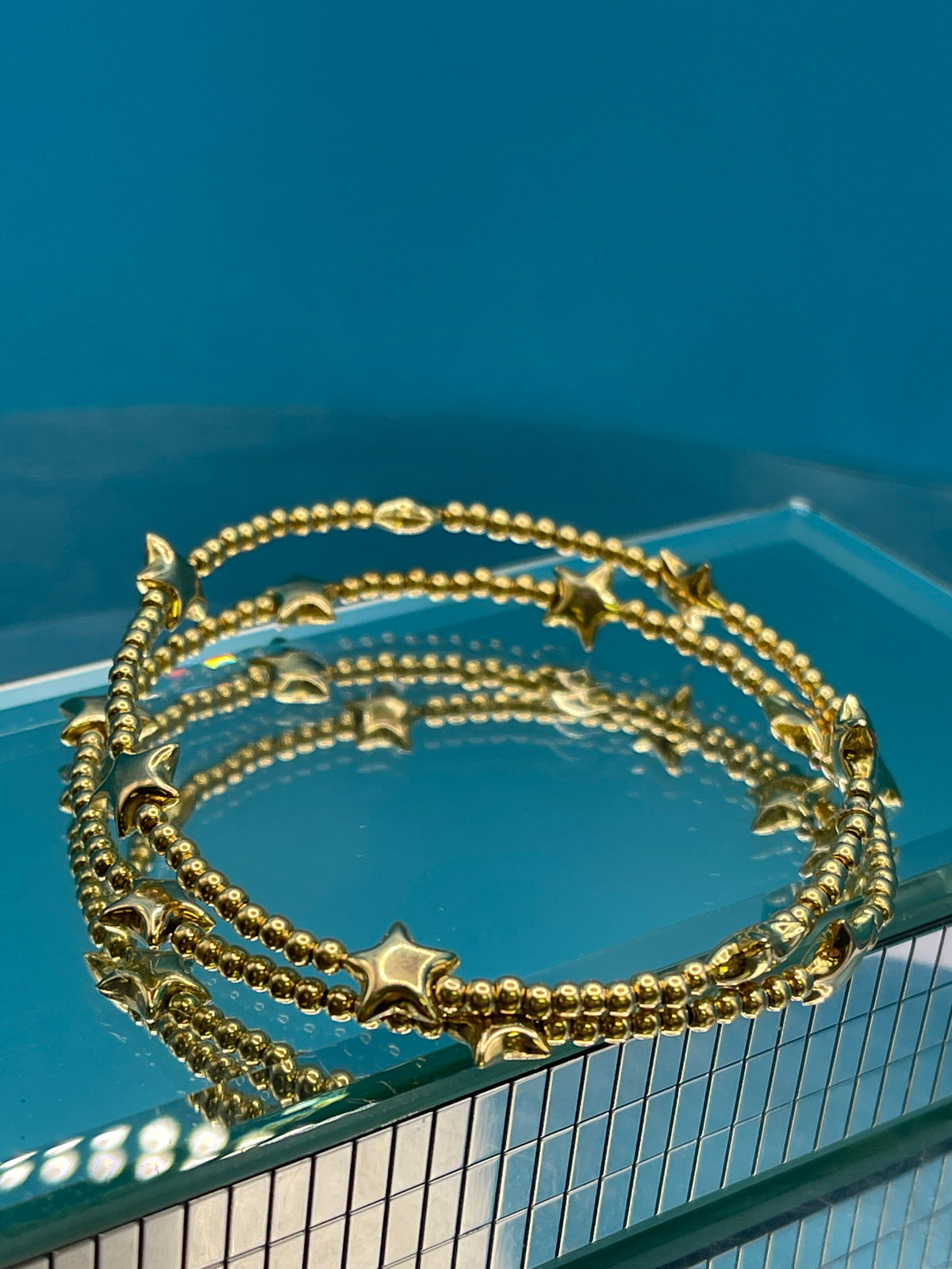 14 Karat Yellow Gold Wrap Around Beaded Star Bracelet