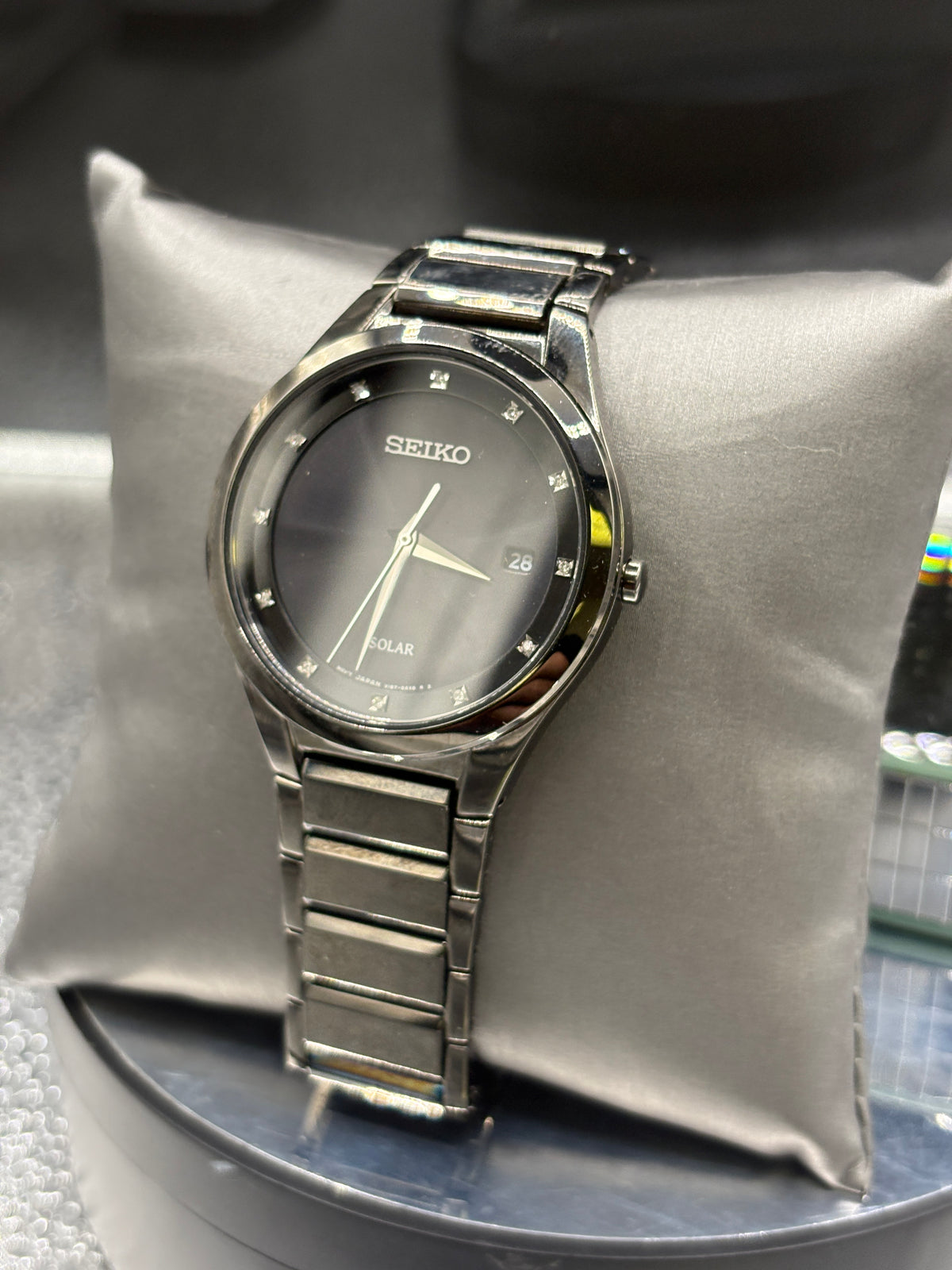 Seiko Mens SNE243 Solar all black dress 12 diamond black dial watch