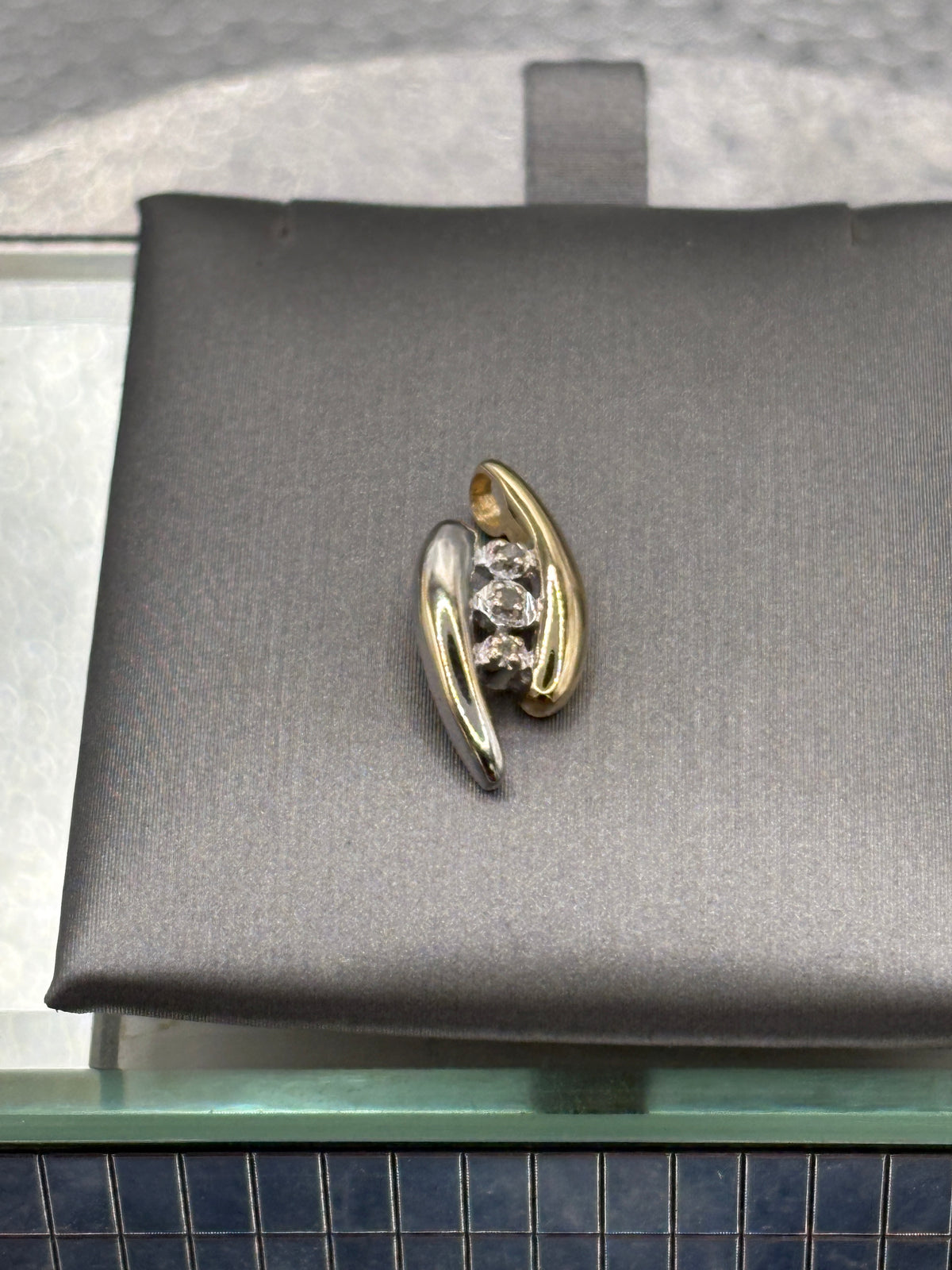 Ladies beautiful 10 Karat Two Tone Gold Diamond Bypass Pendant