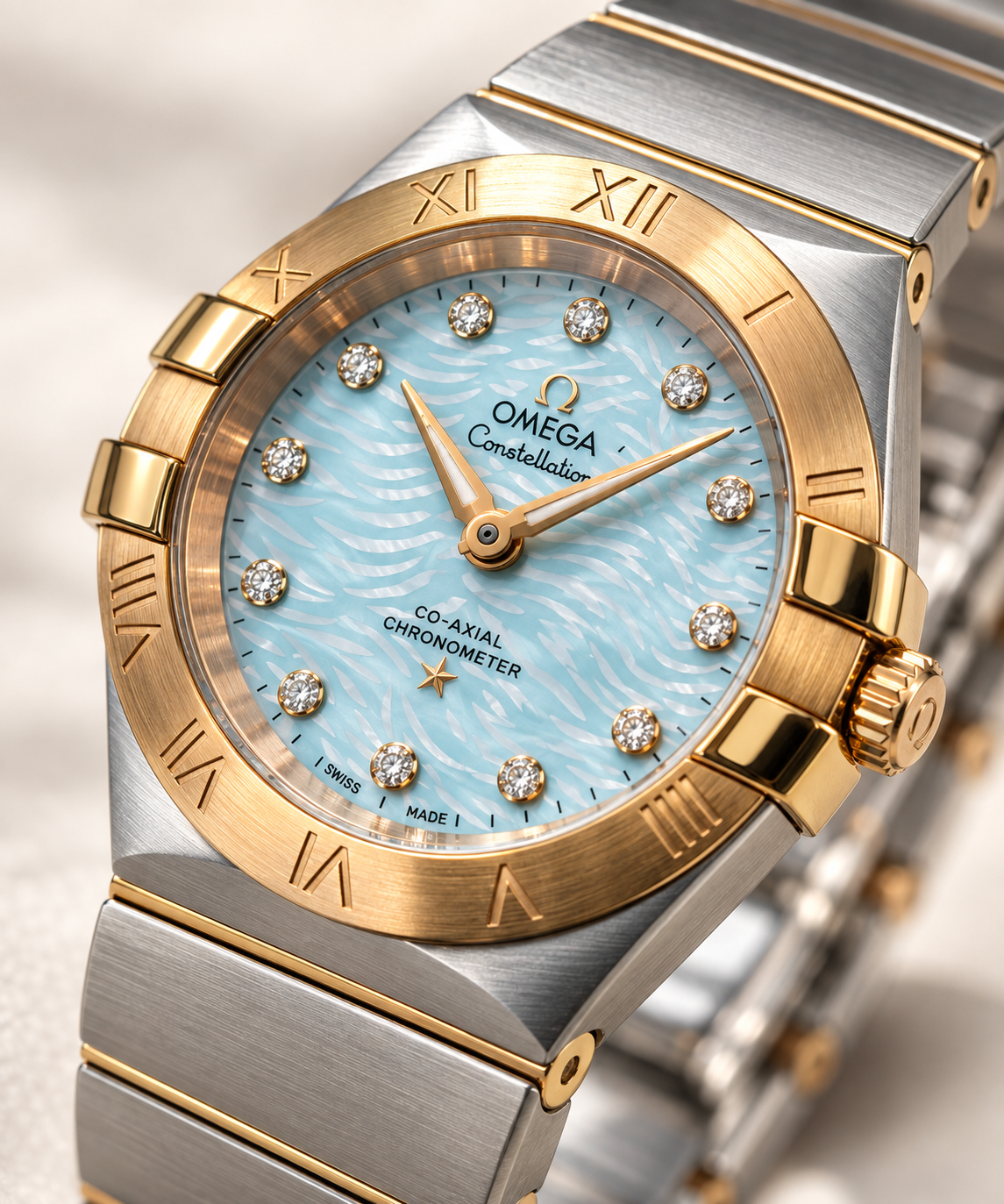Ladies Omega Constellation 18 karat solid rose gold and stainless steel