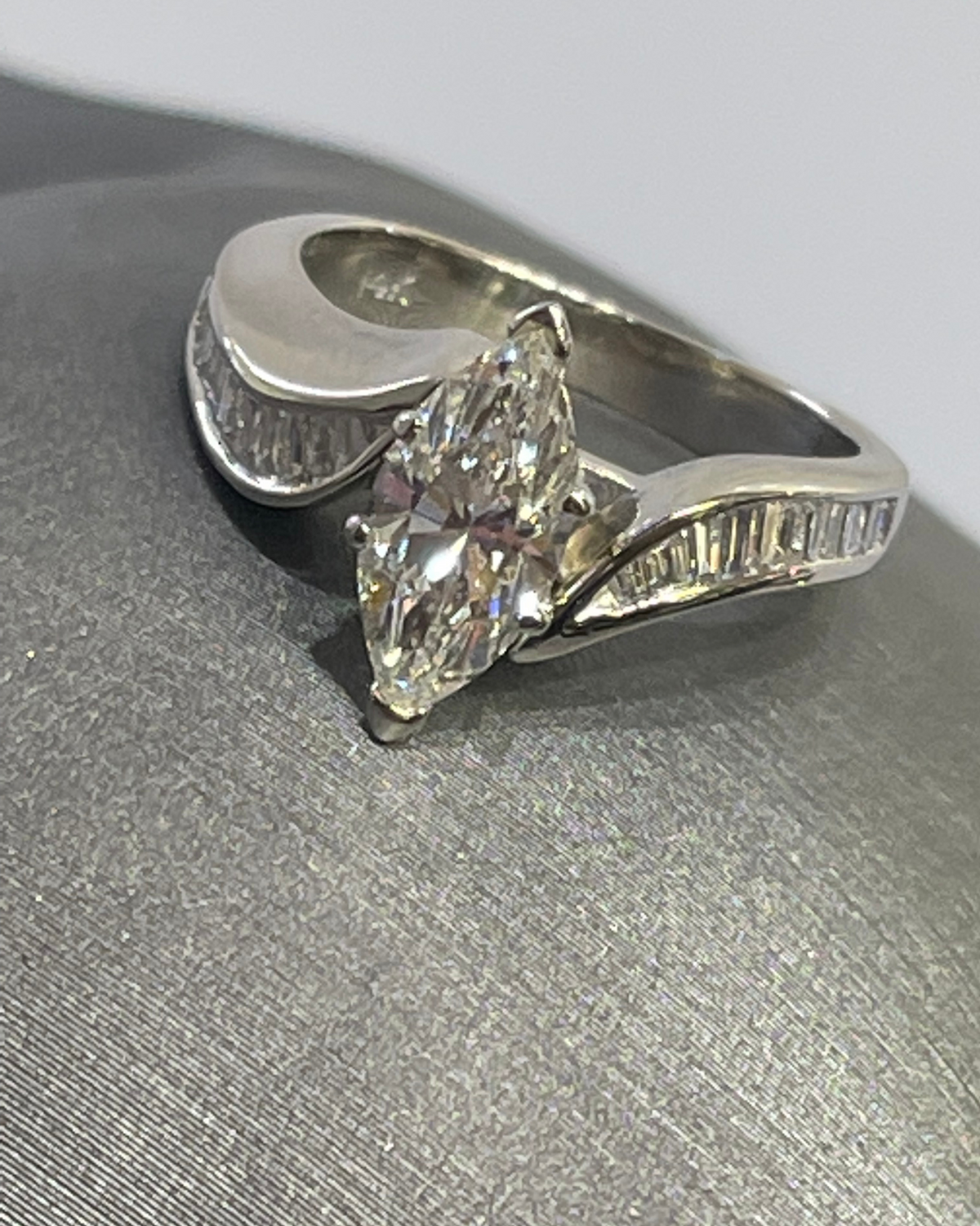 14 Karat White Gold Marquise Shaped Diamond Engagement Ring With Tapered Baguettes