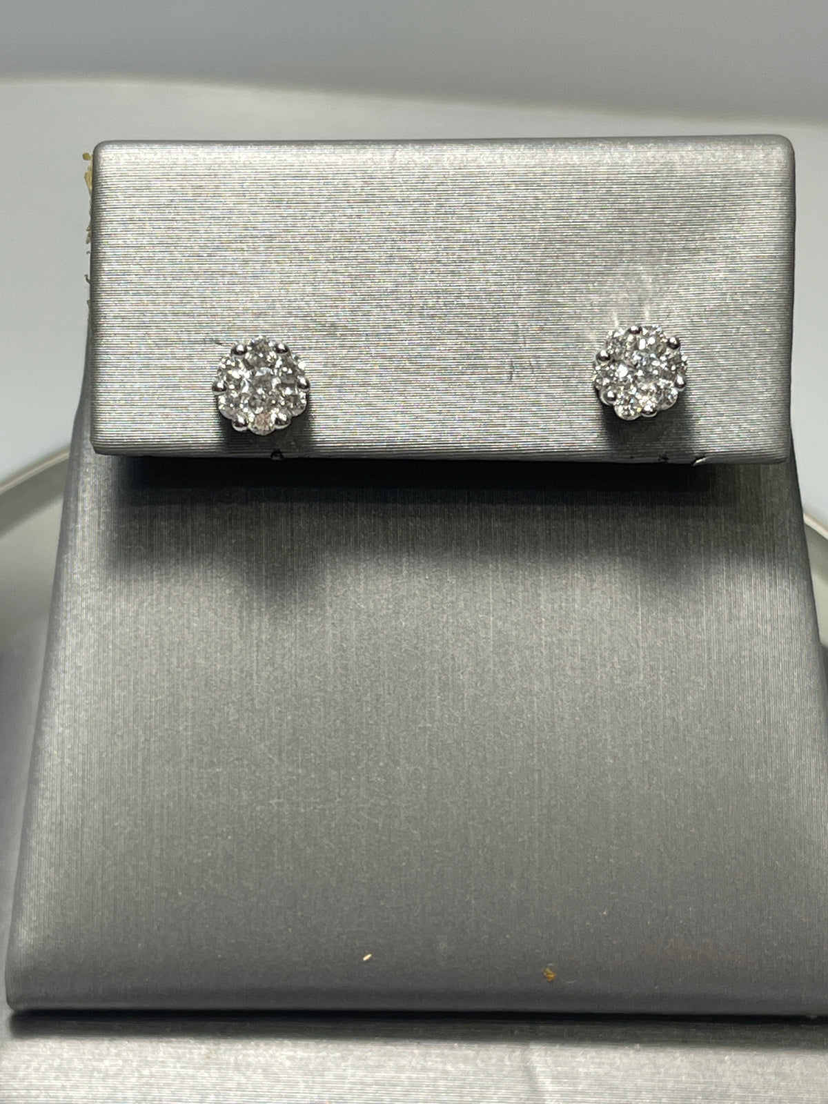 View one of 14 Karat White Gold - Diamond Cluster Floral Motif Stud Earrings