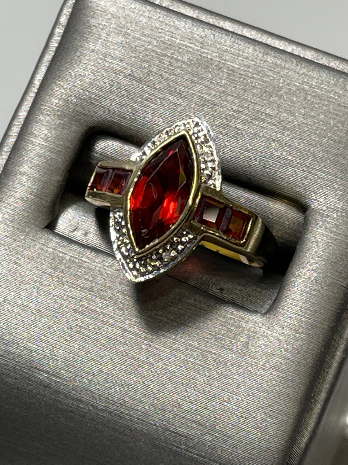 View three of 10 Karat Yellow Gold Garnet And Diamond Accent Ring