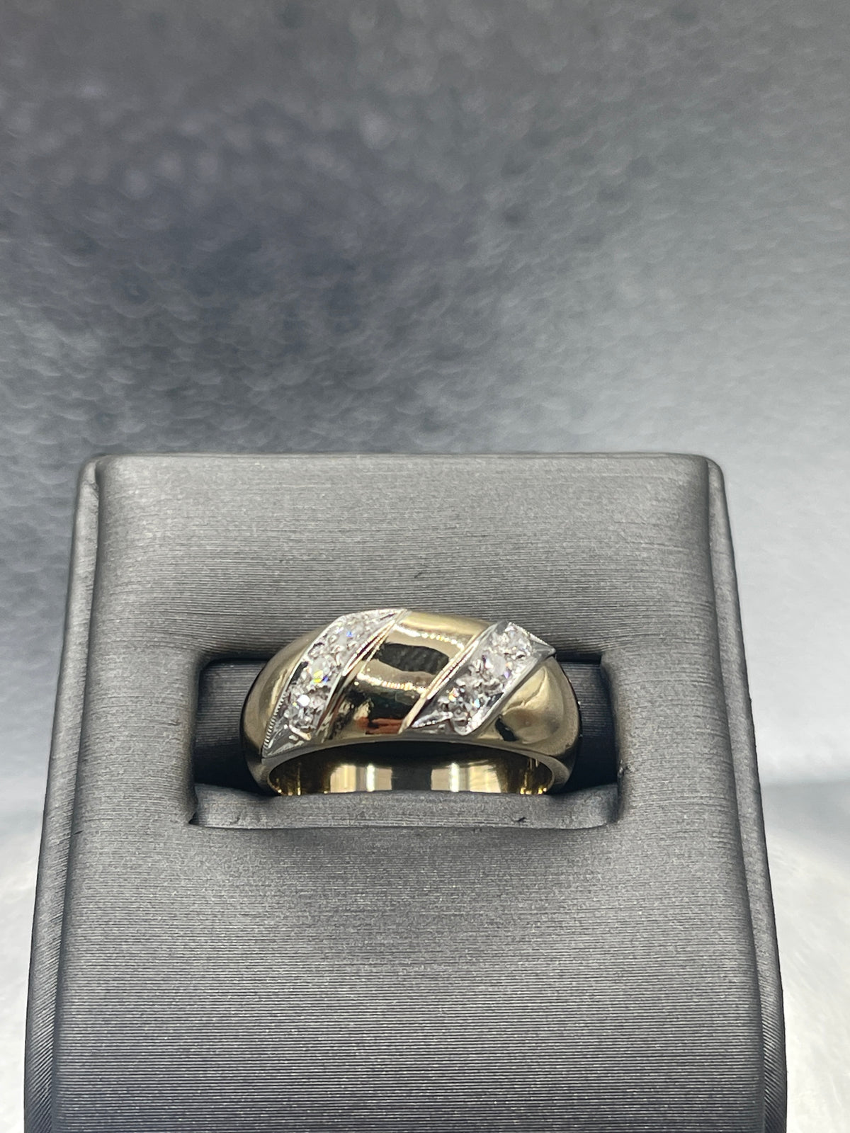 A Beautiful Ladies 14 Karat Gold Dome Style Ring with Angled Diamond Bars