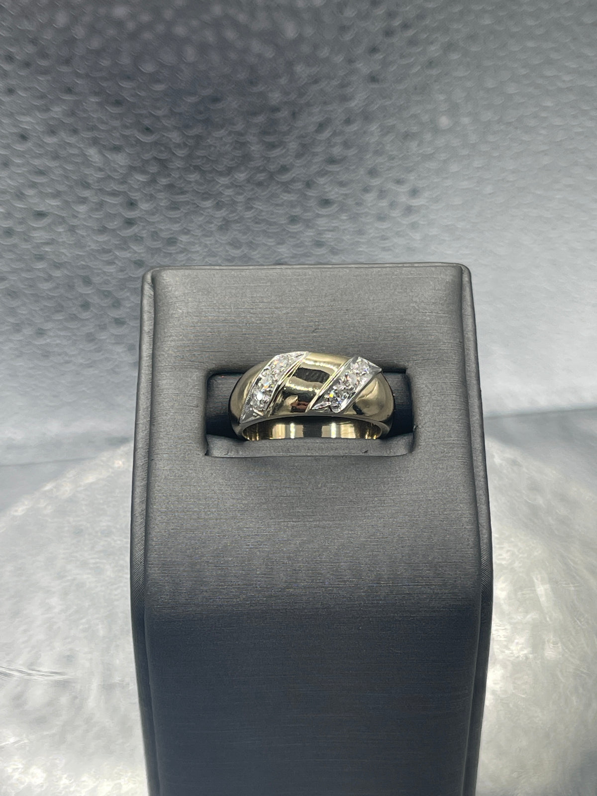 A Beautiful Ladies 14 Karat Gold Dome Style Ring with Angled Diamond Bars