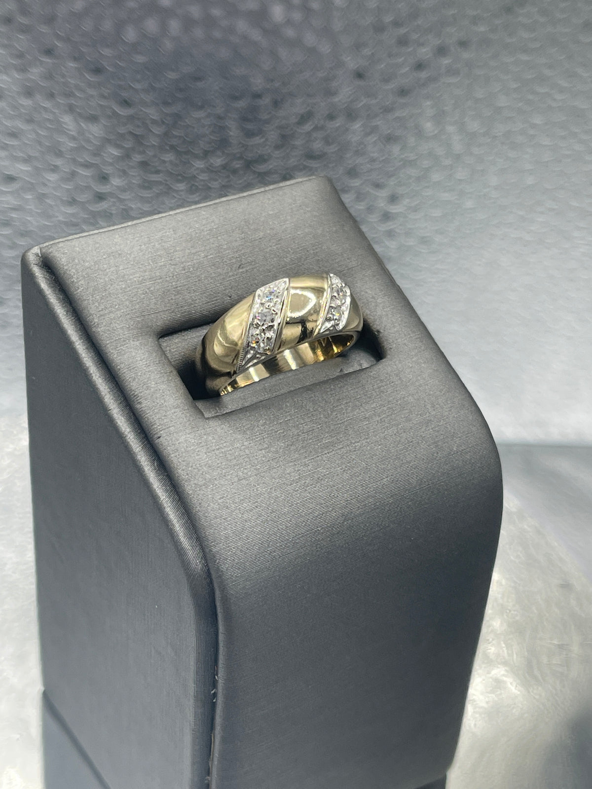 A Beautiful Ladies 14 Karat Gold Dome Style Ring with Angled Diamond Bars