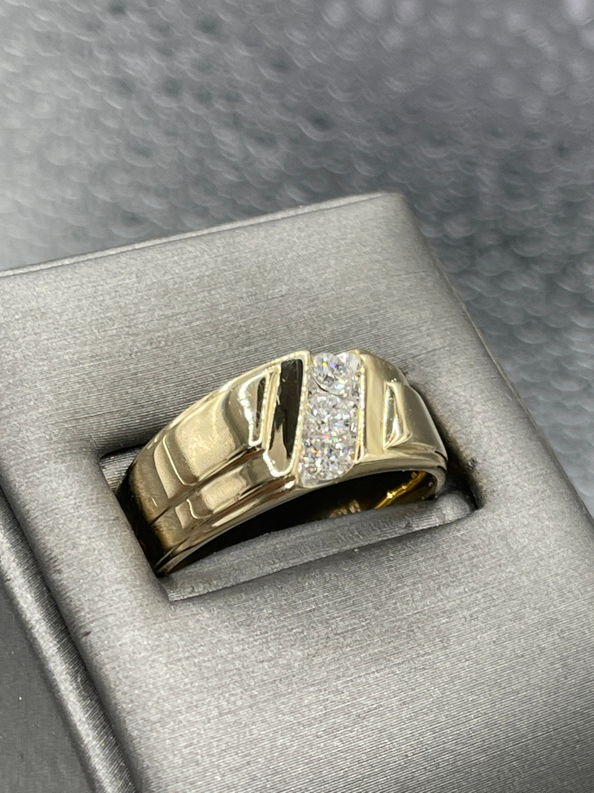 A Handsome Mens 14 Karat Gold Three Diamond Ring