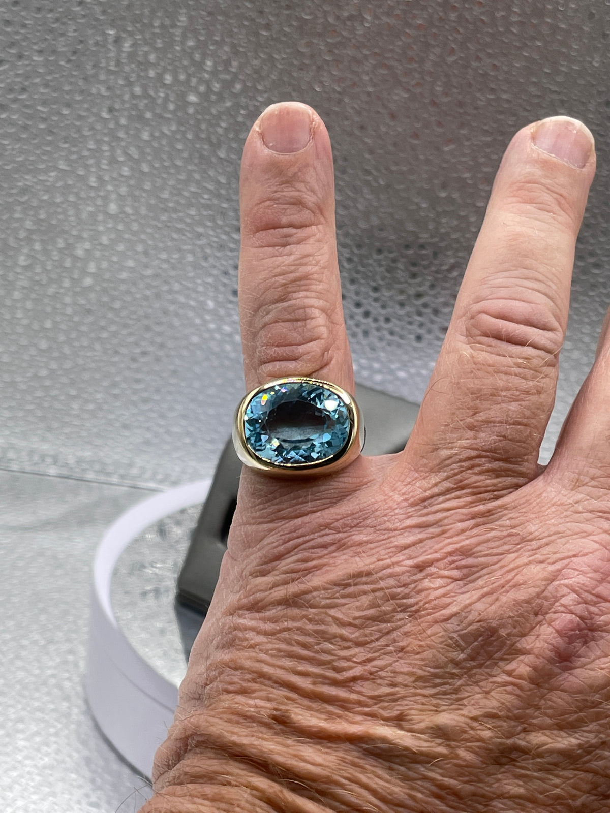 A Fabulous Ladies or Mens 14 Karat Yellow Gold Oval Blue Topaz Ring