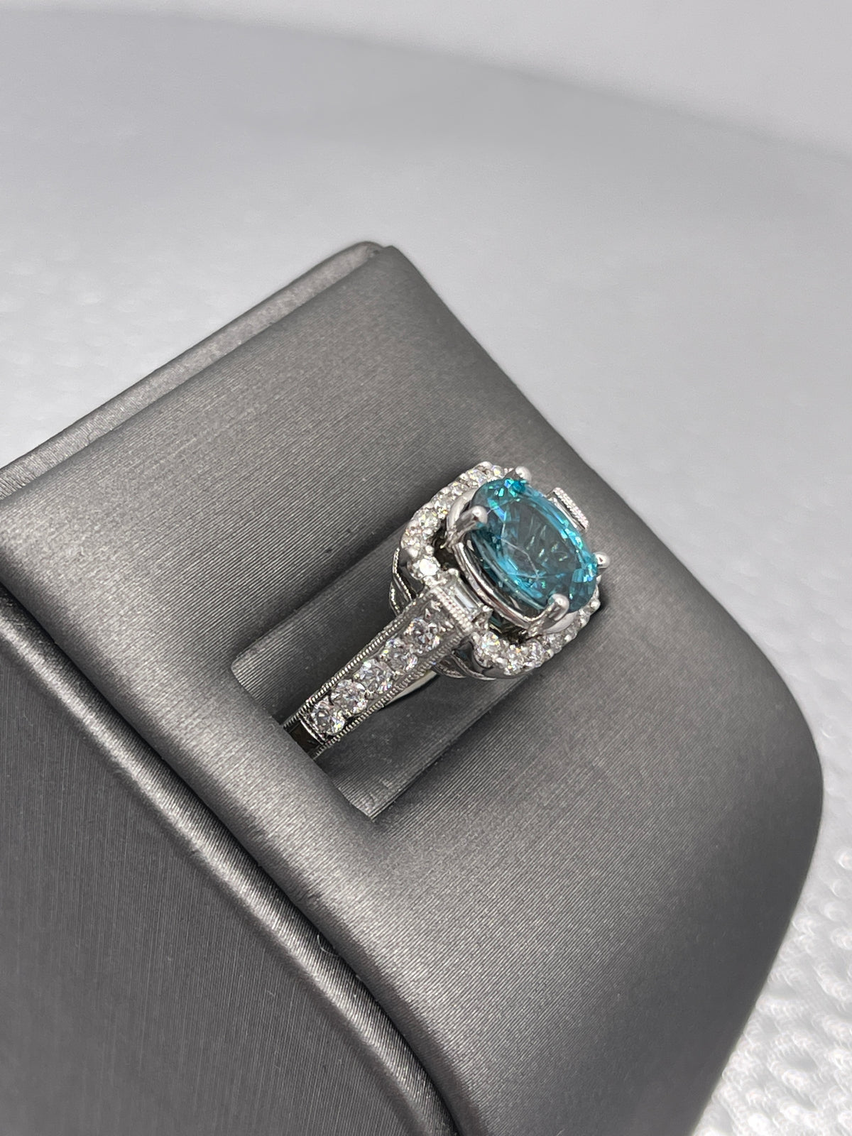 14 Karat White Gold 2 Carat Oval Blue Topaz With Baguettes & Round Diamonds Ring