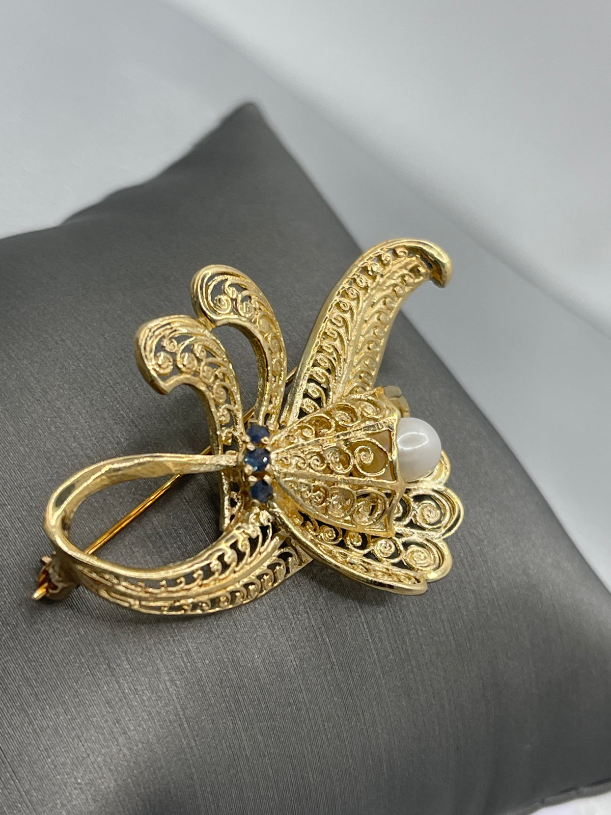 View two of A Romantic Ladies Vintage 14 Karat Gold Pearl & Sapphire Filagree Cornucopia Pin