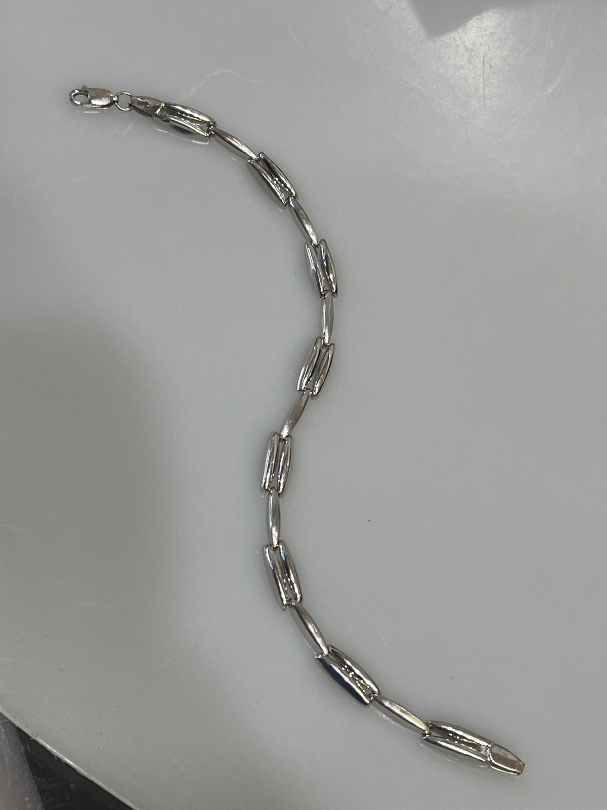 10 KARAT WHITE GOLD MULTI-LINK BRACELET