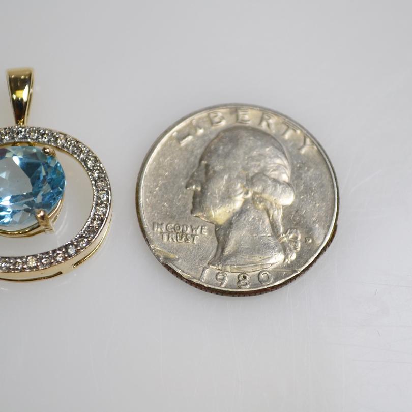 10 Karat Yellow Gold Blue Topaz And Diamond Pendant - Philadelphia Gold & Silver Exchange
