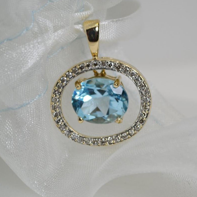 10 Karat Yellow Gold Blue Topaz And Diamond Pendant - Philadelphia Gold & Silver Exchange