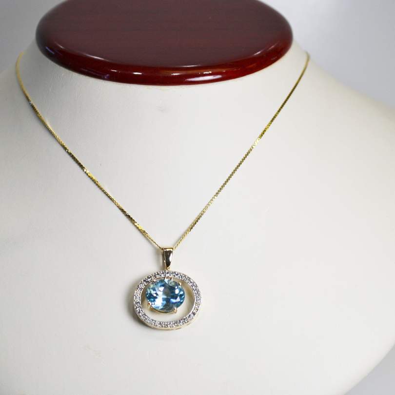 10 Karat Yellow Gold Blue Topaz And Diamond Pendant - Philadelphia Gold & Silver Exchange