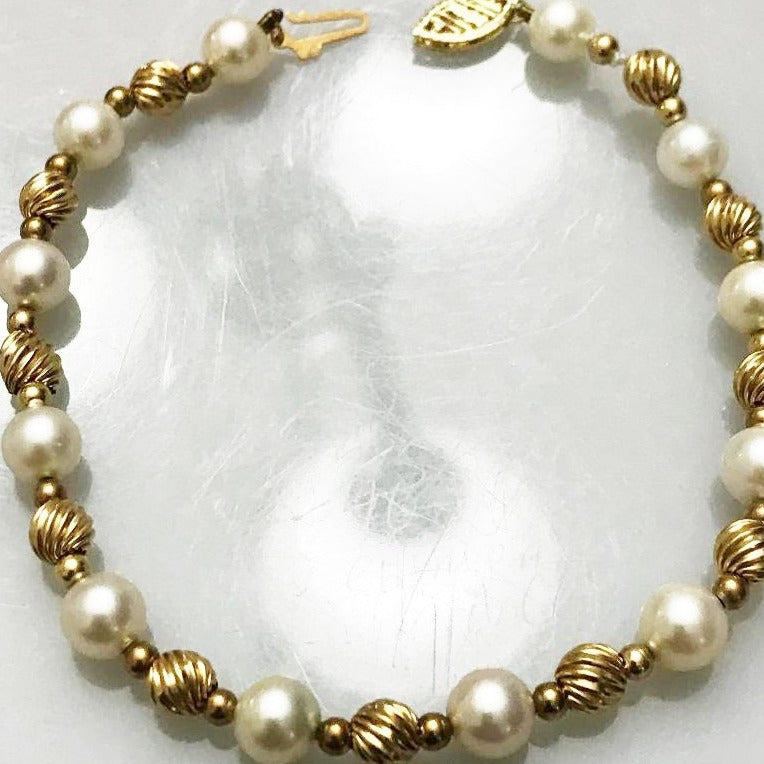 View one of 14 Karat Solid Yellow Gold Corrugated Ball And Pearl Bracelet 8" Long