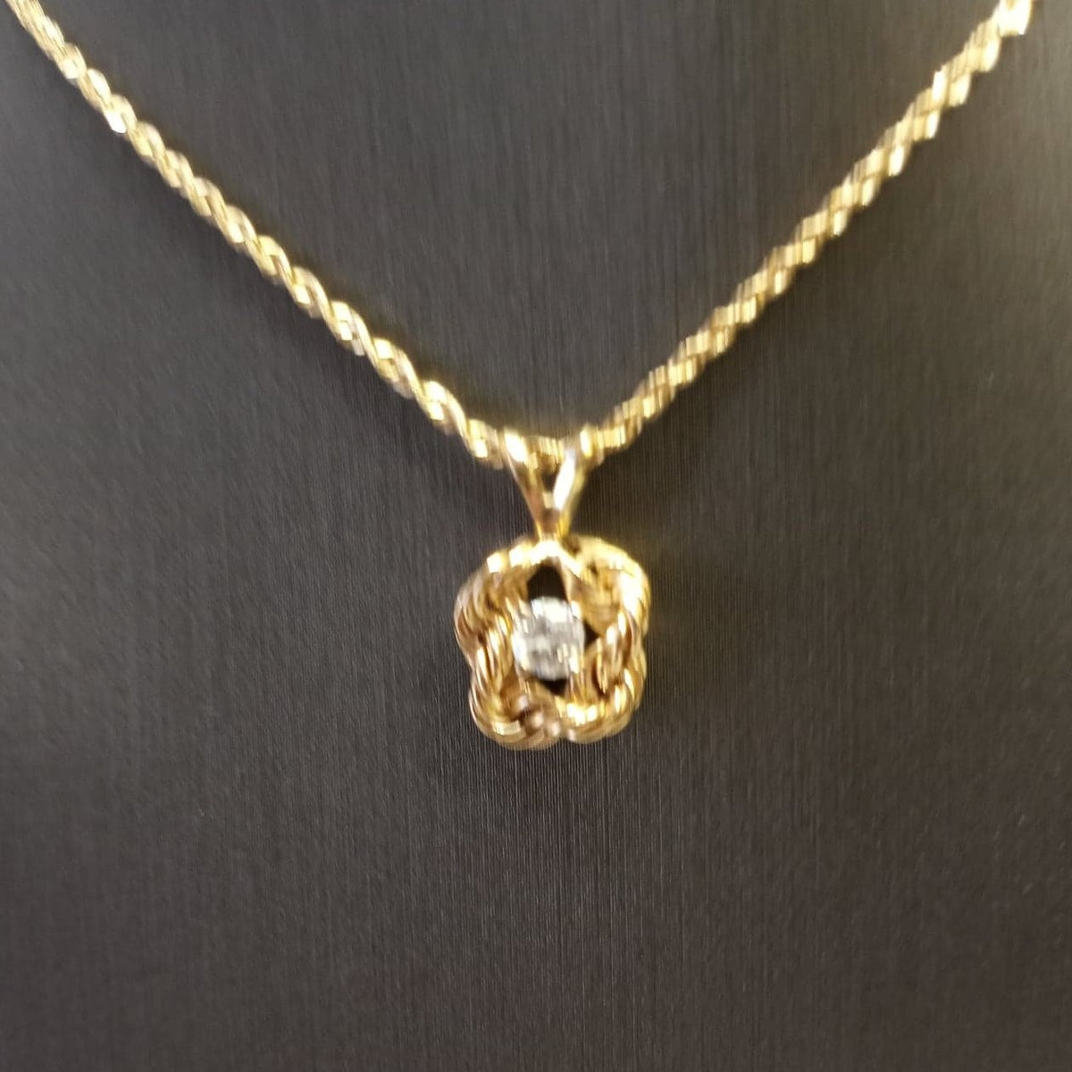 View two of 14 Karat Yellow Gold Di Cut Rope Chain With Diamond Pendant