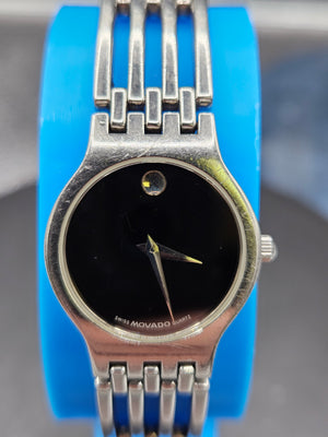 Vintage Movado Esperanza with crystal and black dial face, stainless steel bracelet