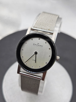 Vintage Skagen stainless steel watch. Jewel hour markers and mesh strap