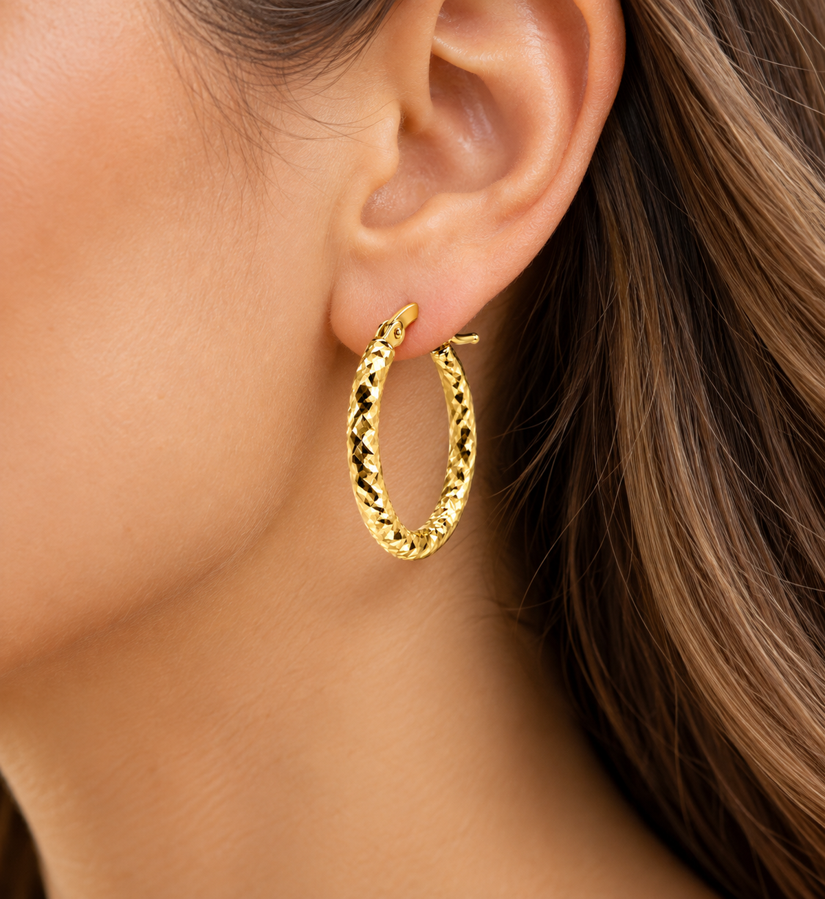 Ladies 14K Solid Yellow Gold Oval Hoop Earrings with Diamond-Cut Design