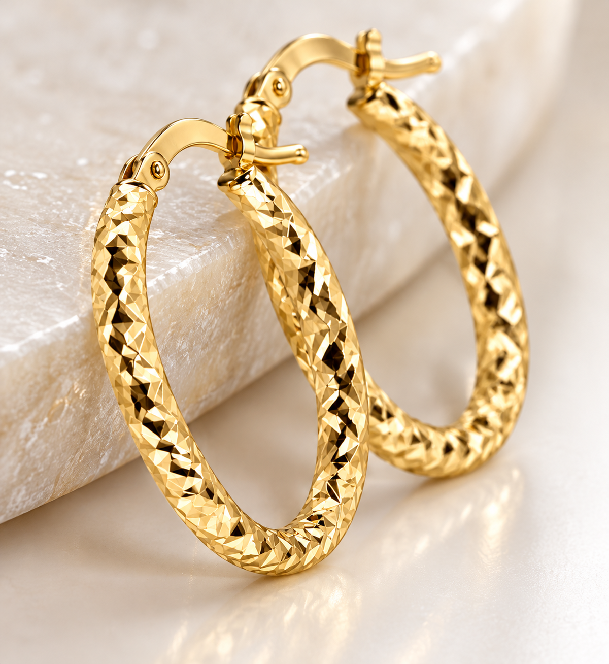 Ladies 14K Solid Yellow Gold Oval Hoop Earrings with Diamond-Cut Design