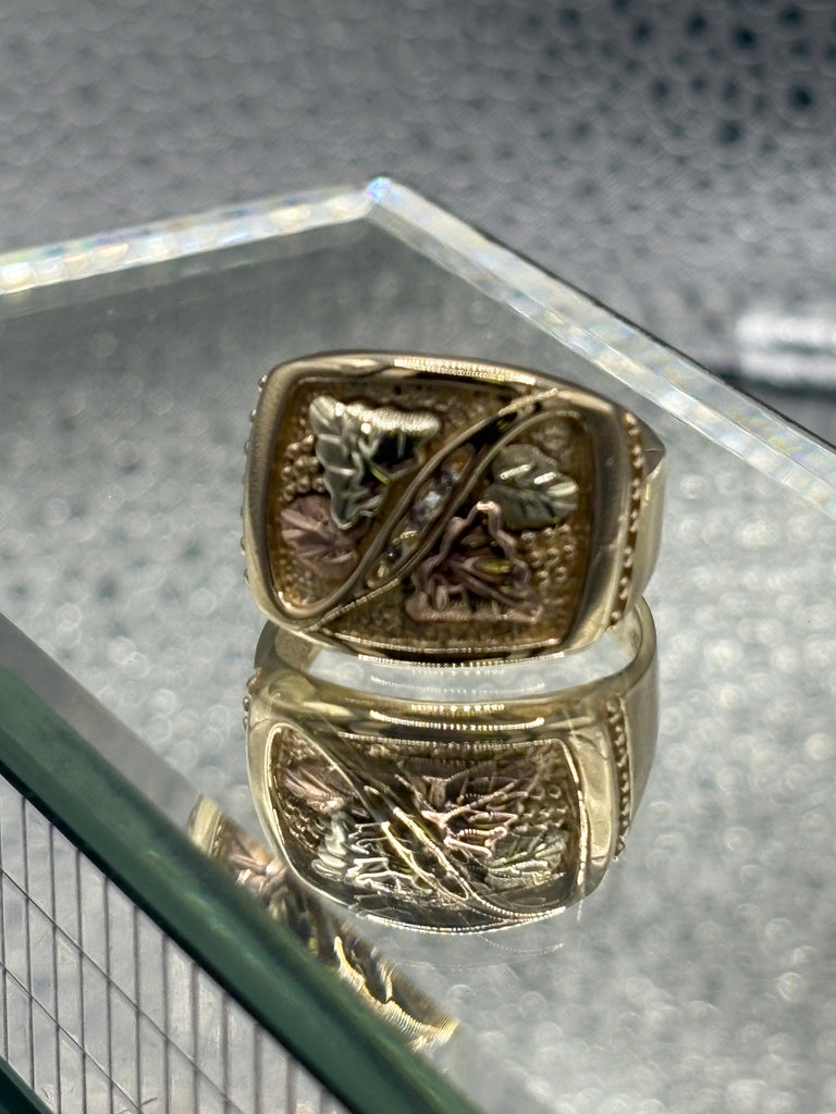 View ten of Ladies / Gents 10 Karat Black Hills Gold Ring & Diamonds