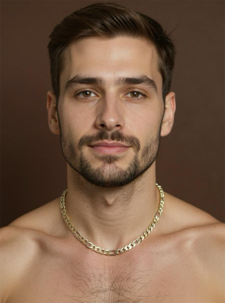 Man wearing a gold chain necklace against a brown background