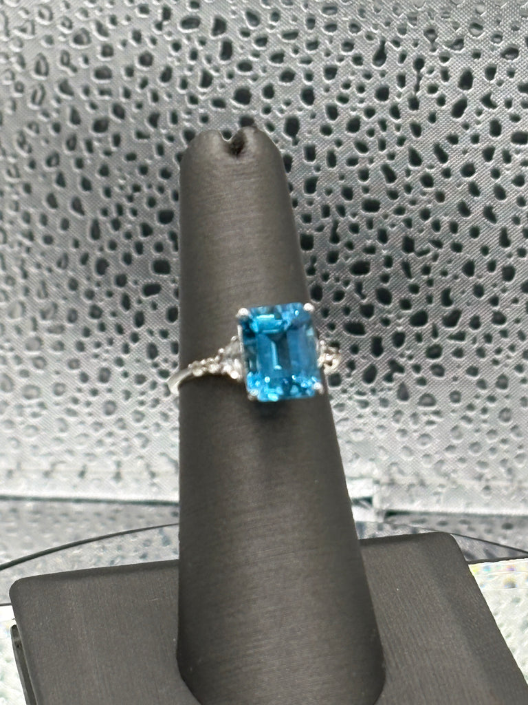 Ladies 10 Karat White Gold Emerald Cut Blue Topaz Ring
