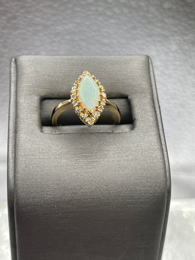 View one of Ladies Vintage 10 Karat Yellow Gold Opal & Diamond Halo Ring