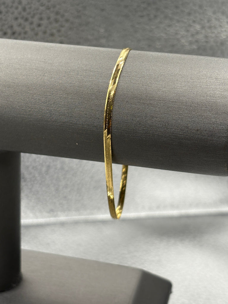 14 Karat Yellow Gold Ladies Beveled Herringbone Bracelet