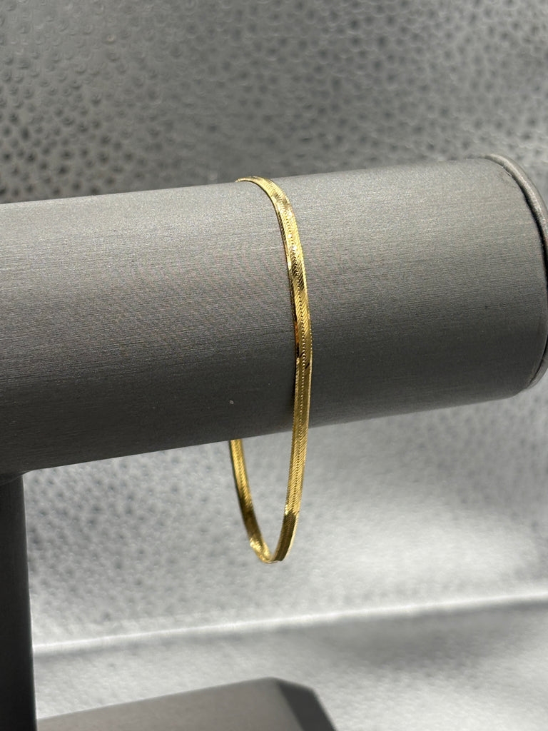 14 Karat Yellow Gold Ladies Beveled Herringbone Bracelet
